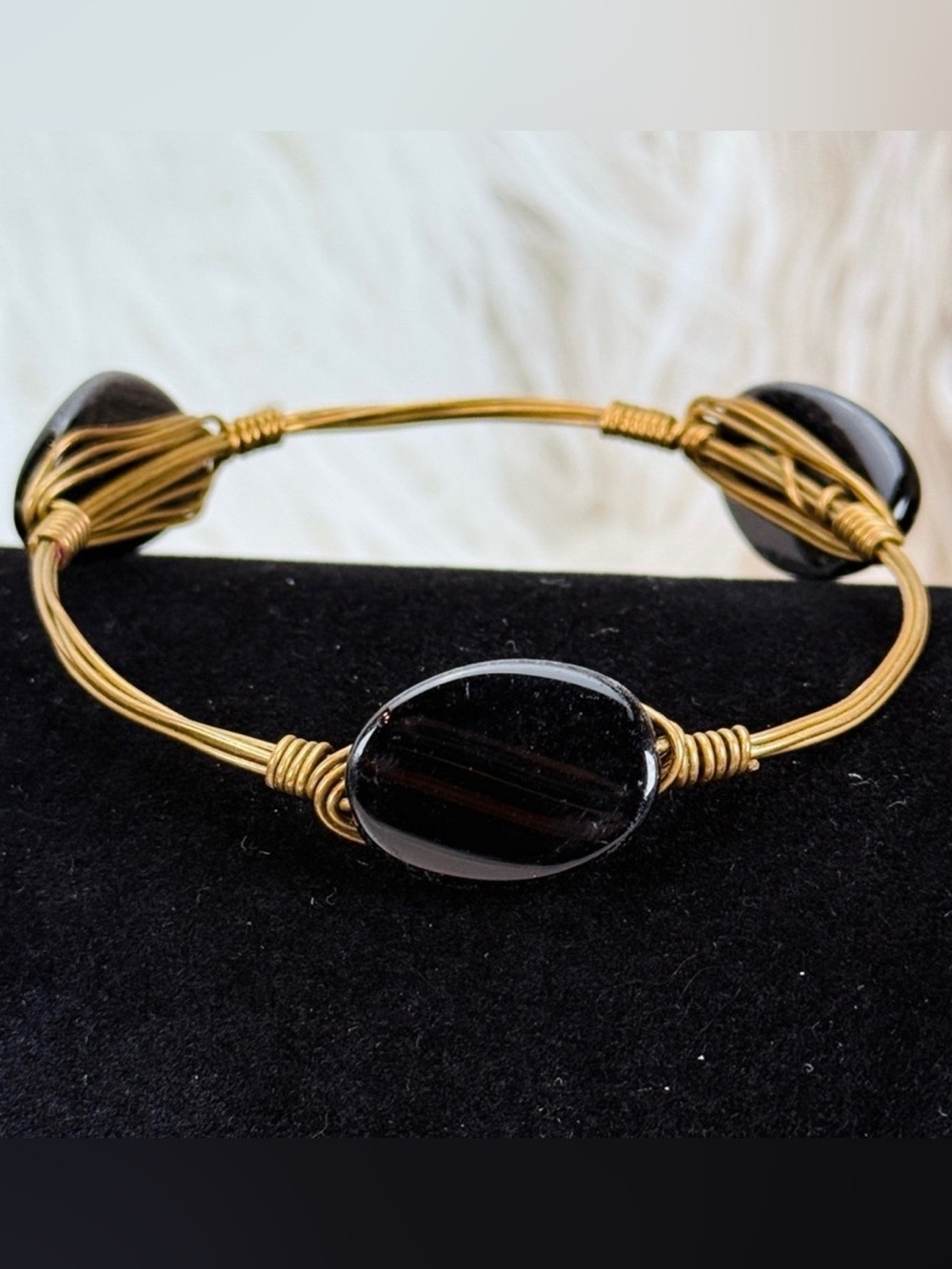 Vintage bronze tone wire wrapped black bracelet
